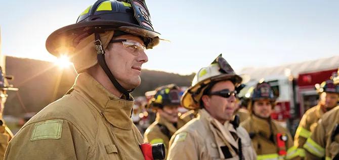 Group of firefighters standing outdoors