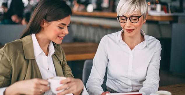 A female financial professional meeting with a client to perform a financial review