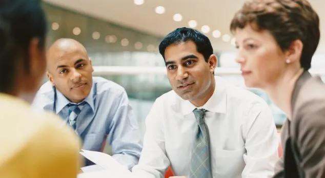 Group of professionals having a discussion 