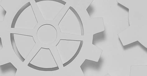 All white abstract image of wheels of knowledge churning 