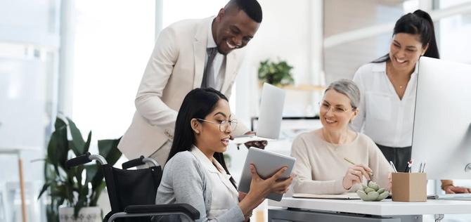 Shes got a lot to show them. a group of diverse businesspeople having an informal meeting in their office
