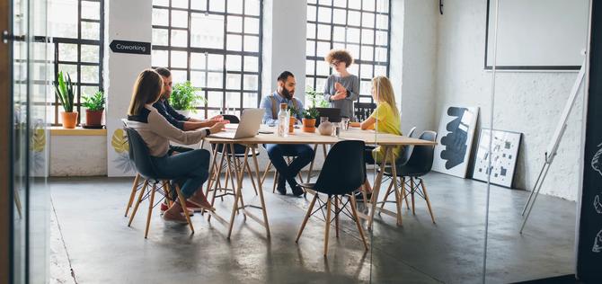 Group of a business people having meeting in a conference room.
