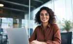 https://s.mj.run/TSZ380S3Kts Female business executive working on laptop in modern office, sitting at desk with glass walls and smiling into camera. She is wearing glasses and brown blouse shirt, with documents beside her. The room has natural light from windows, creating an atmosphere of success and professional usisng white lighting to highlight details. Shot by Nikon D850 DSLR --ar 3:2 --v 6.1 Job ID: e7ce8487-b161-4dd8-b8c5-9465e541026e