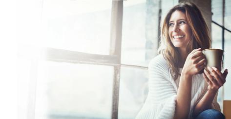 Shot of an attractive young woman relaxing at home