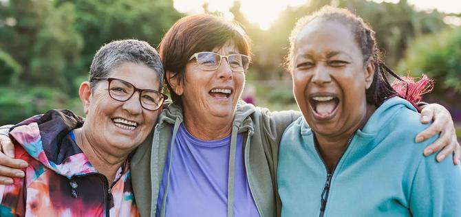 Group of women laughing together.