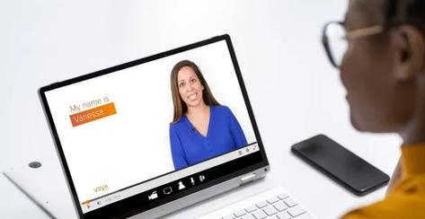 A women watching a live Voya Learn educational session over zoom.