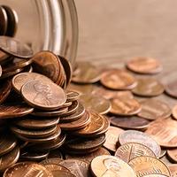 Pennies spilling from a jar