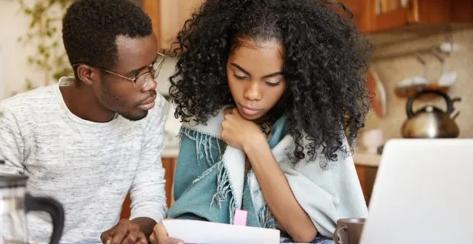 Couple reviewing their finances.