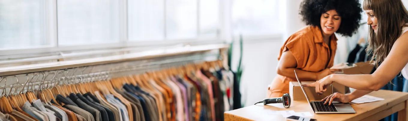 women business owners working in their store