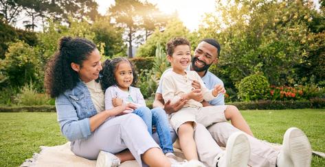 Picnic, nature or happy family relax, laugh or enjoy outdoor quality time together, funny joke and comedy. Summer freedom, green grass field or bonding mother, father and kids laughing in garden park.