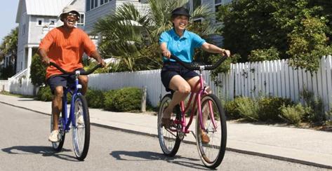 Senior couple riding bikes