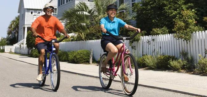 Senior couple riding bikes