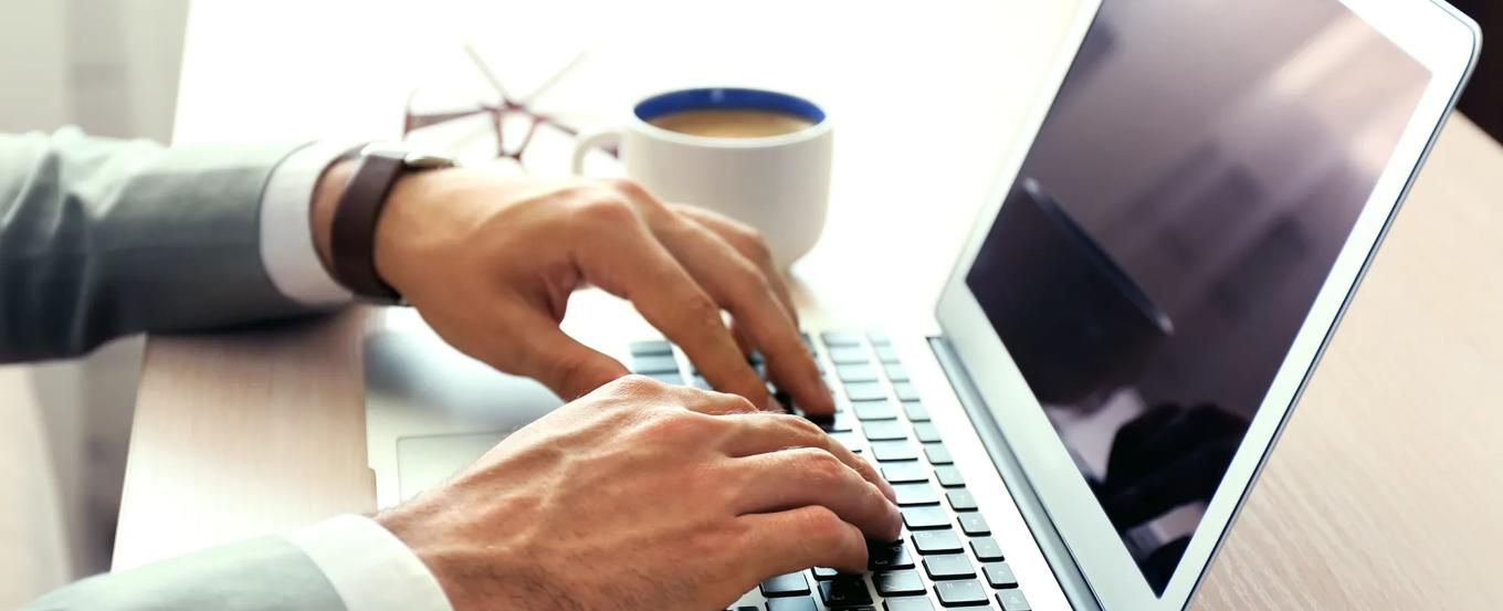 Man working with laptop in office